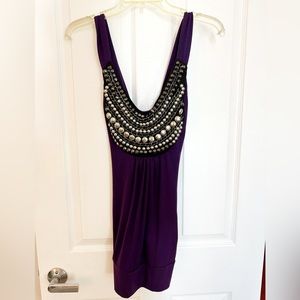 Deep purple tank top with cross cross back with hardware appliqué